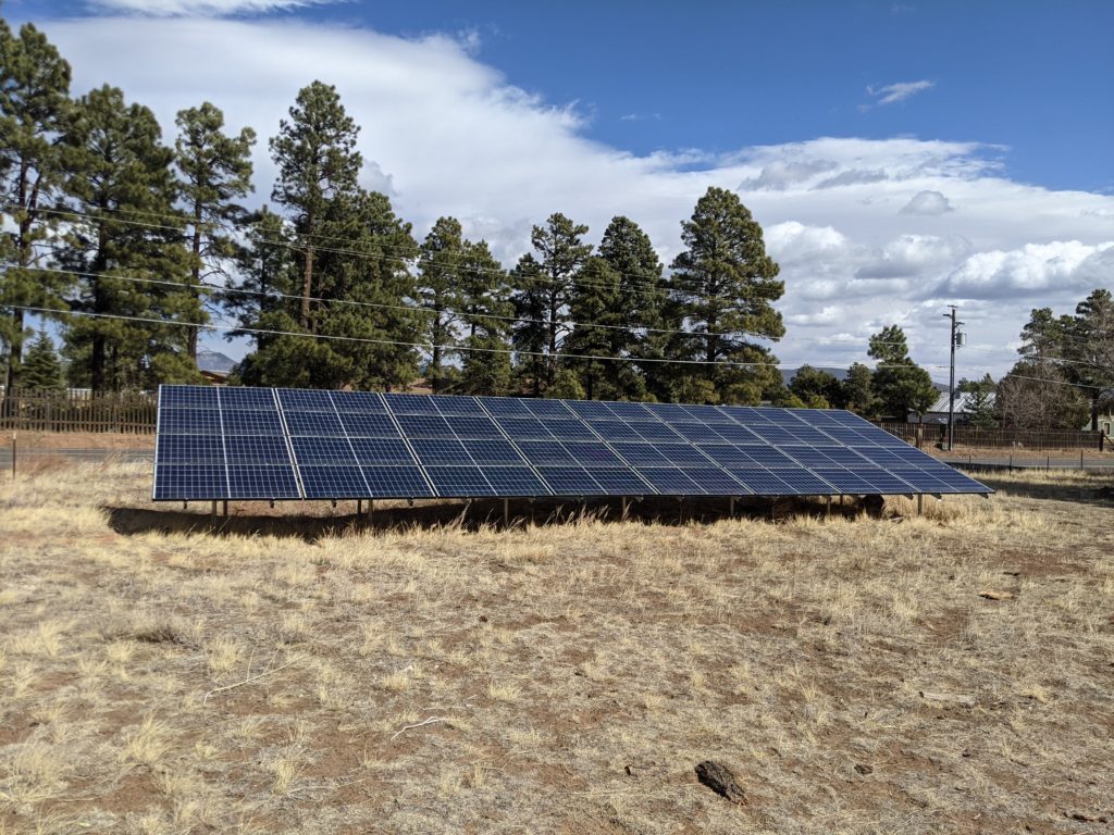 9.3 kW ground mount Rooftop Solar system in Flagstaff, Arizona consisting of 32 REC 290-watt panels and a Fronius Primo inverter.