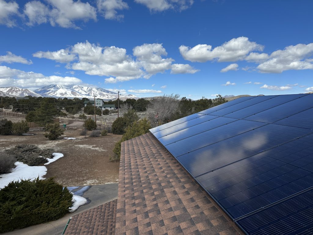 11.8 kW solar system in Flagstaff, AZ with mountains in background