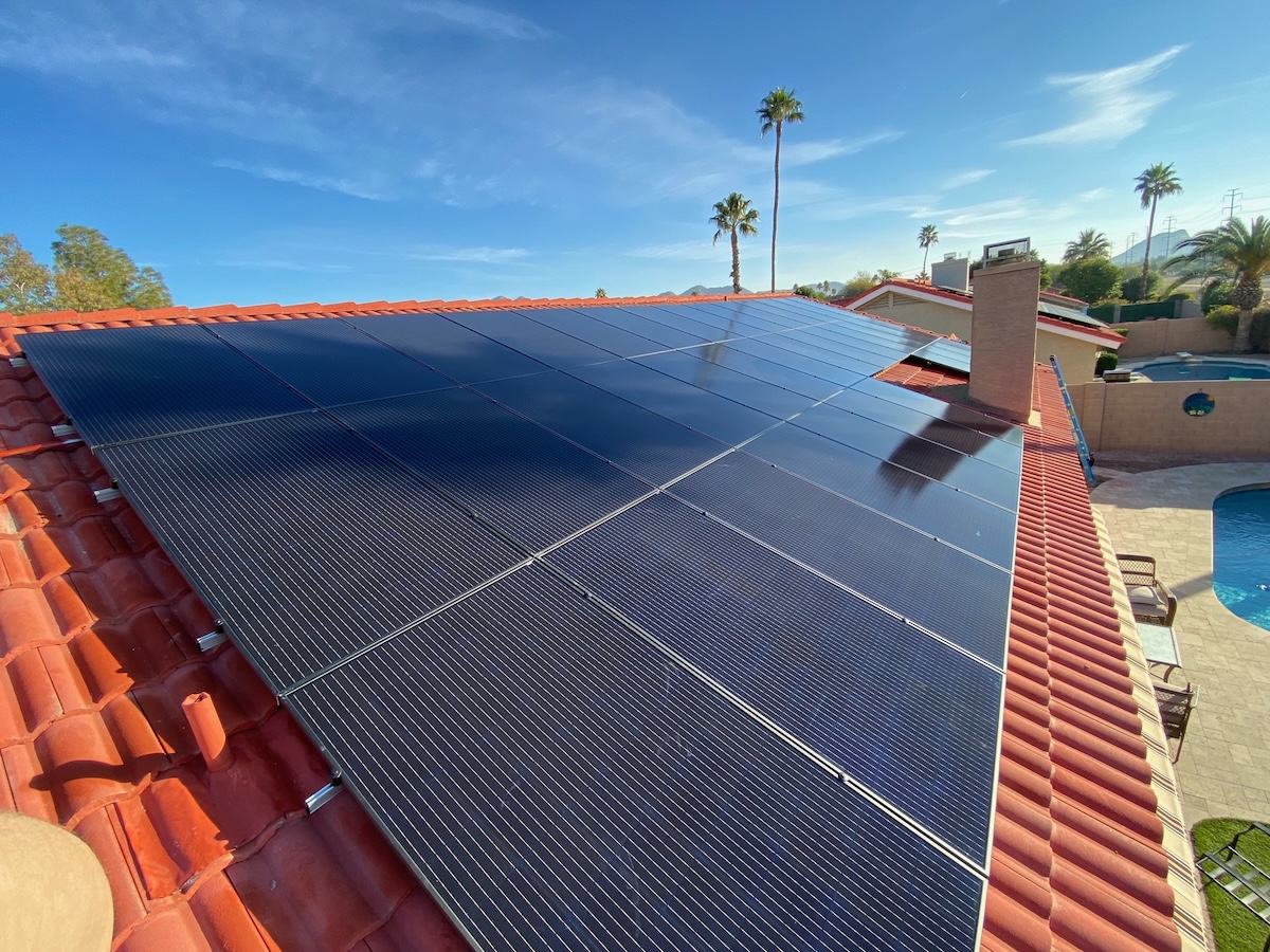 Rooftop solar panel installation in Phoenix, Arizona generating clean energy for a residential home.