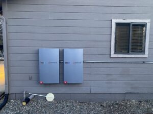 Enphase home battery storage installation on exterior wall in Northern Arizona providing solar backup power and energy independence.