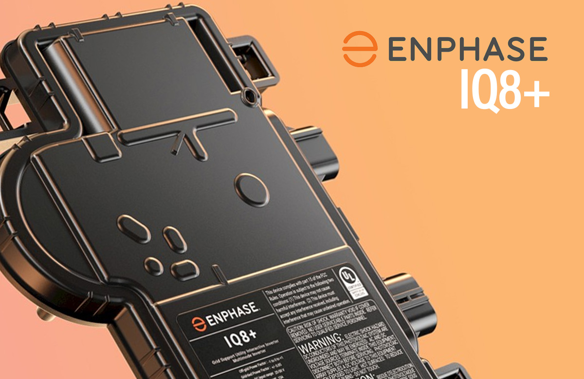 Close-up of an Enphase IQ8 microinverter installed on a solar panel system.