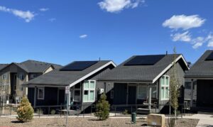 Solar-powered Habitat starter homes with rooftop arrays at Timber Sky Flagstaff Arizona